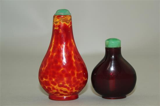 Two Chinese glass snuff bottles, 18th / 19th century, 4.1cm, the latter with jadeite stopper